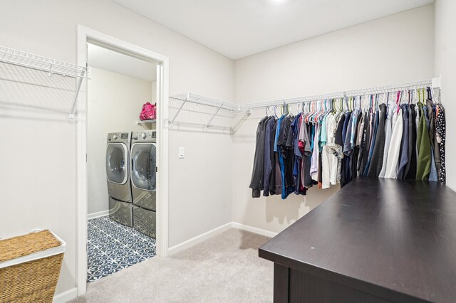 11504 Yuma Ln N, Dayton, MN 55369 - walk in closet with washer and clothes dryer and carpet floors