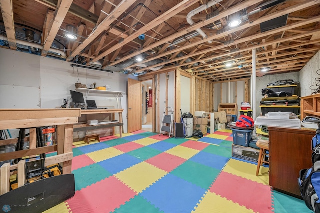 unfinished basement with tile patterned floors