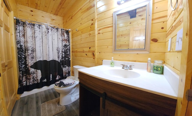 5227 Hyland Rd SW, Motley, MN 56466 - bathroom with toilet, wood walls, and wood finished floors