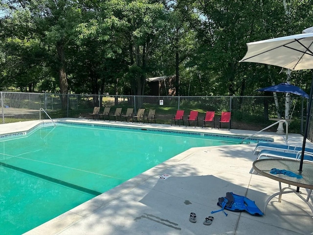 5227 Hyland Rd SW, Motley, MN 56466 - community pool featuring fence and a patio area
