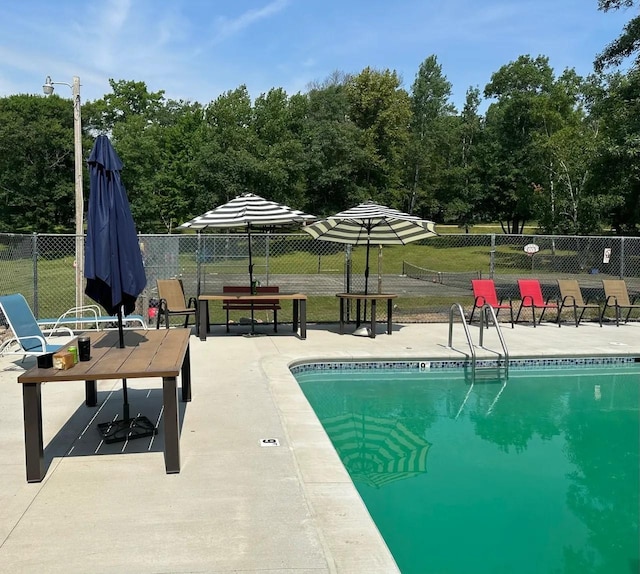 5227 Hyland Rd SW, Motley, MN 56466 - pool featuring a patio and fence