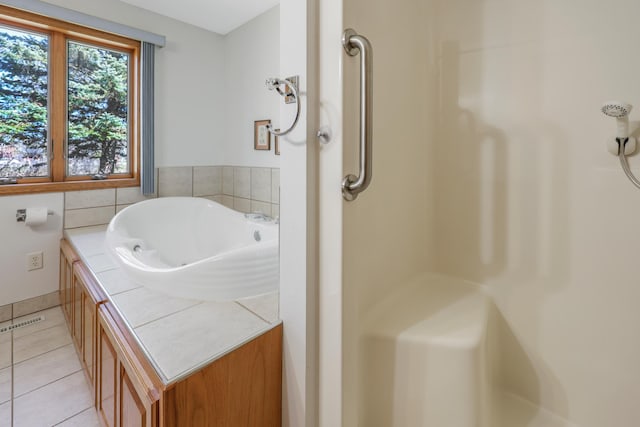 full bathroom featuring a shower, visible vents, and tile patterned flooring