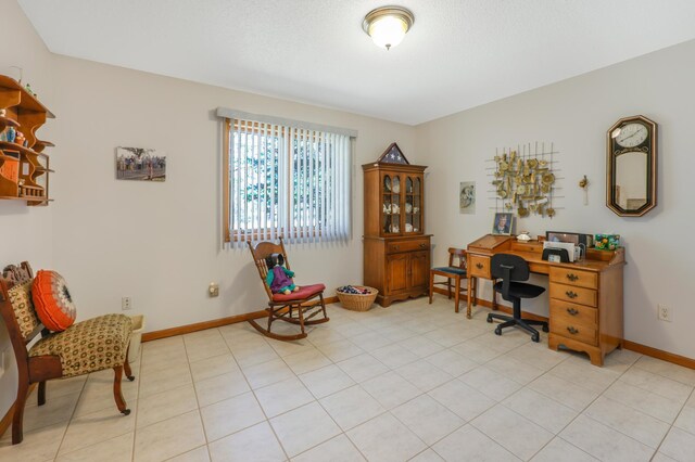 office space with baseboards