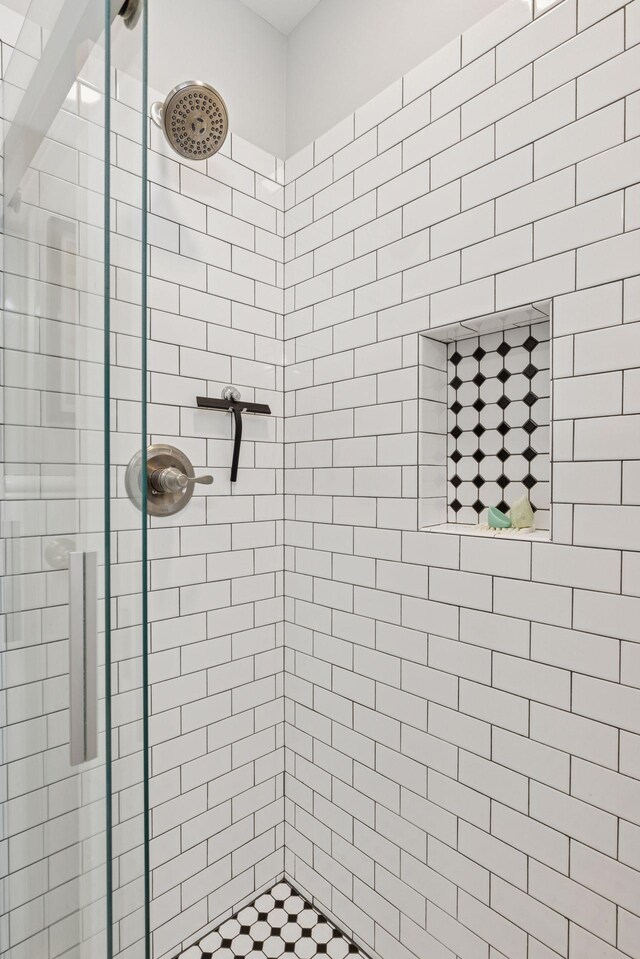 bathroom with a stall shower