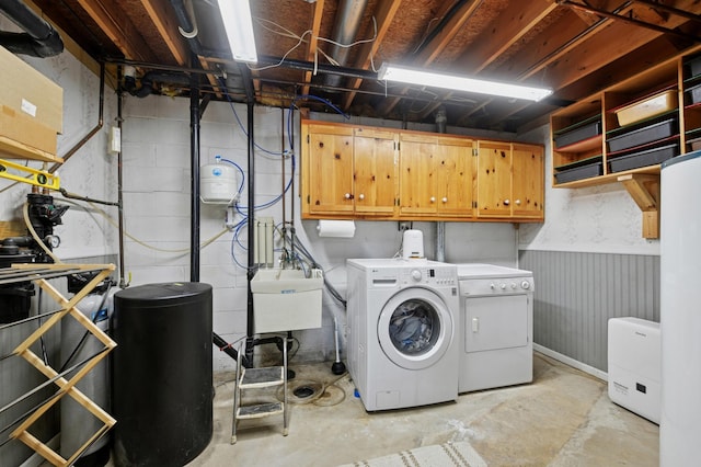 3021 Devon Ln, Mound, MN 55364 - washroom featuring separate washer and dryer and cabinet space