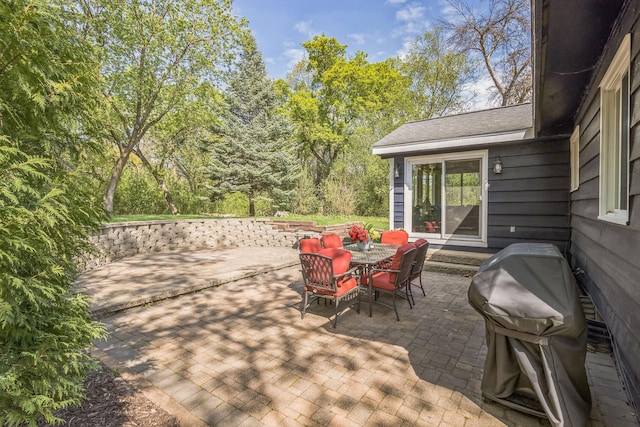 12720 Parkwood Dr, Burnsville, MN 55337 - view of patio with grilling area and outdoor dining area