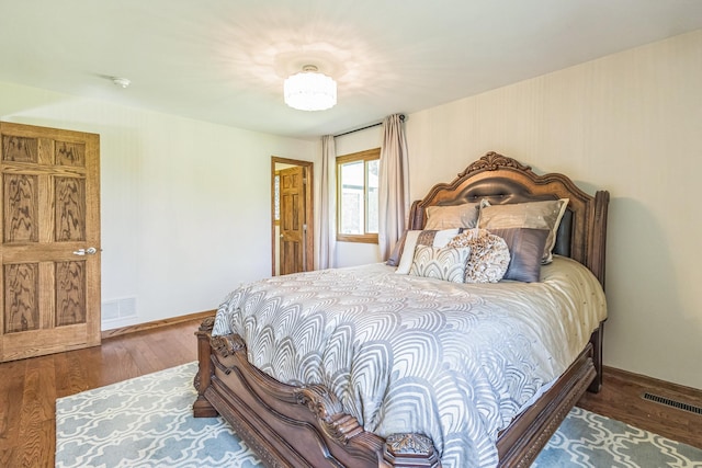 12720 Parkwood Dr, Burnsville, MN 55337 - bedroom with wood finished floors and baseboards