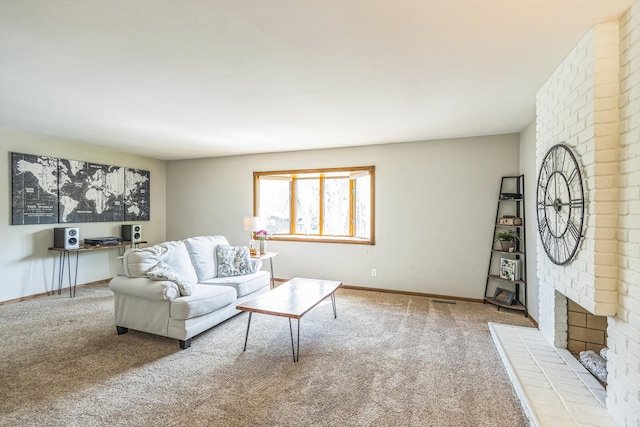 12720 Parkwood Dr, Burnsville, MN 55337 - carpeted living area featuring baseboards and a fireplace