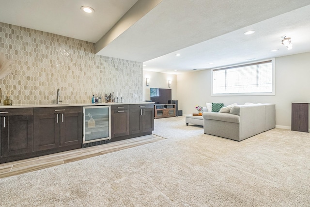 12720 Parkwood Dr, Burnsville, MN 55337 - indoor wet bar with wine cooler, light carpet, tasteful backsplash, and recessed lighting