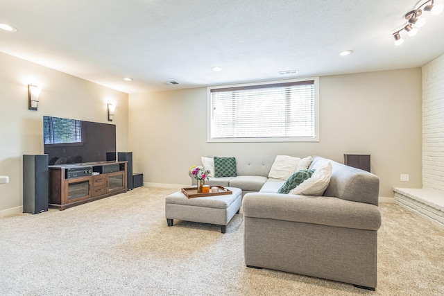 12720 Parkwood Dr, Burnsville, MN 55337 - carpeted living room featuring baseboards and recessed lighting