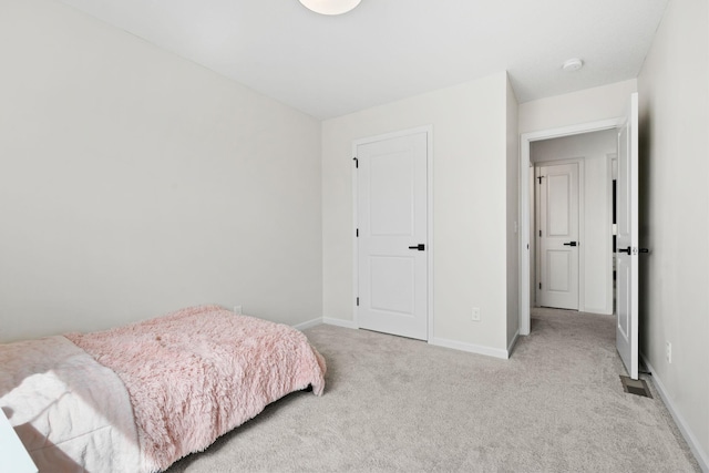 10257 Greenway Cir S, Cottage Grove, MN 55016 - bedroom featuring light colored carpet and baseboards