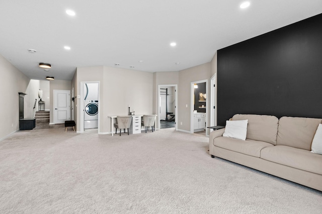10257 Greenway Cir S, Cottage Grove, MN 55016 - living room with washer / clothes dryer, light colored carpet, baseboards, and recessed lighting