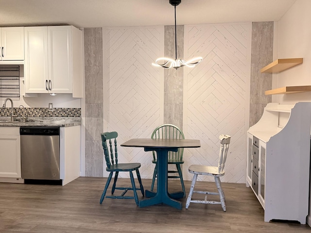 dining space featuring wood finished floors
