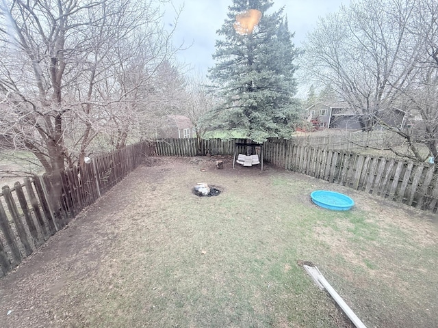 view of yard featuring a fenced backyard
