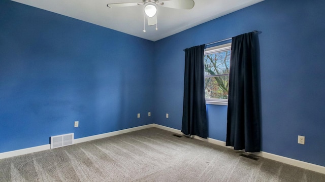 3219 Anric Dr, Eau Claire, WI 54701 - unfurnished room with baseboards, ceiling fan, carpet, and visible vents