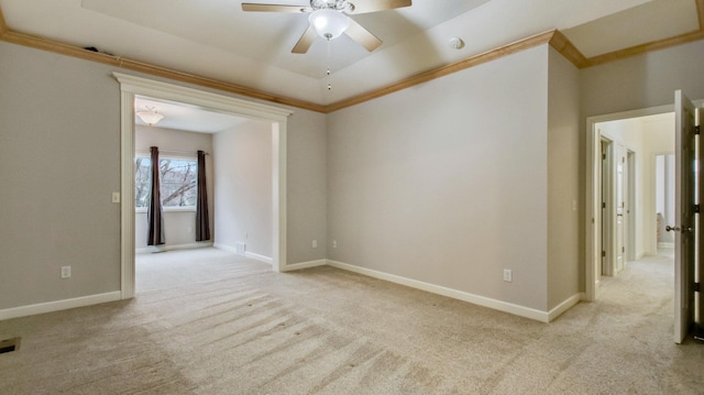 3219 Anric Dr, Eau Claire, WI 54701 - empty room with carpet flooring, ceiling fan, visible vents, and a tray ceiling
