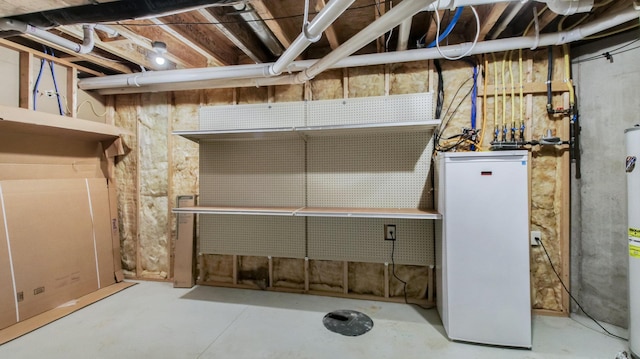 3219 Anric Dr, Eau Claire, WI 54701 - unfinished basement with fridge