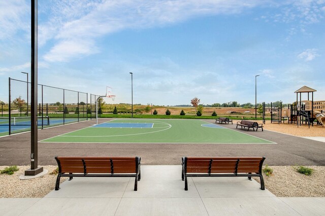 17240 Durham Dr, Lakeville, MN 55044 - view of basketball court with fence, community basketball court, and a healthy amount of sunlight