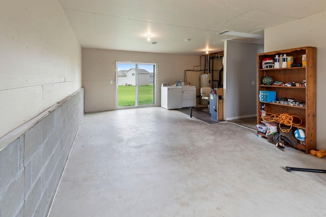 below grade area with independent washer and dryer and electric water heater