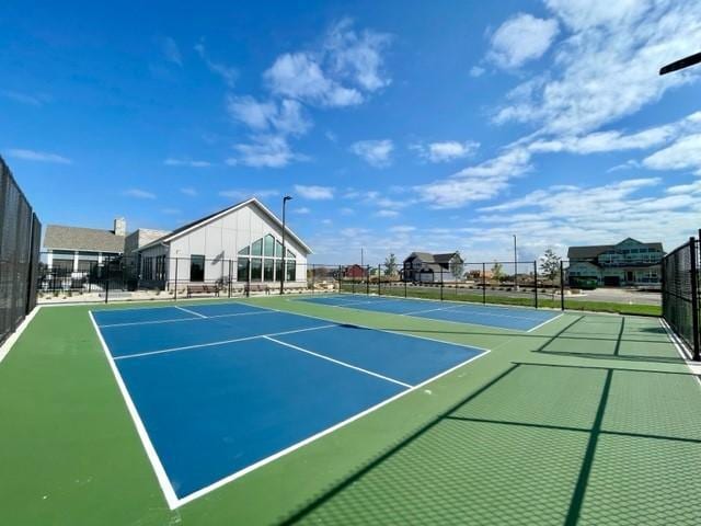17232 Durham Dr, Lakeville, MN 55044 - view of tennis court with community basketball court and fence