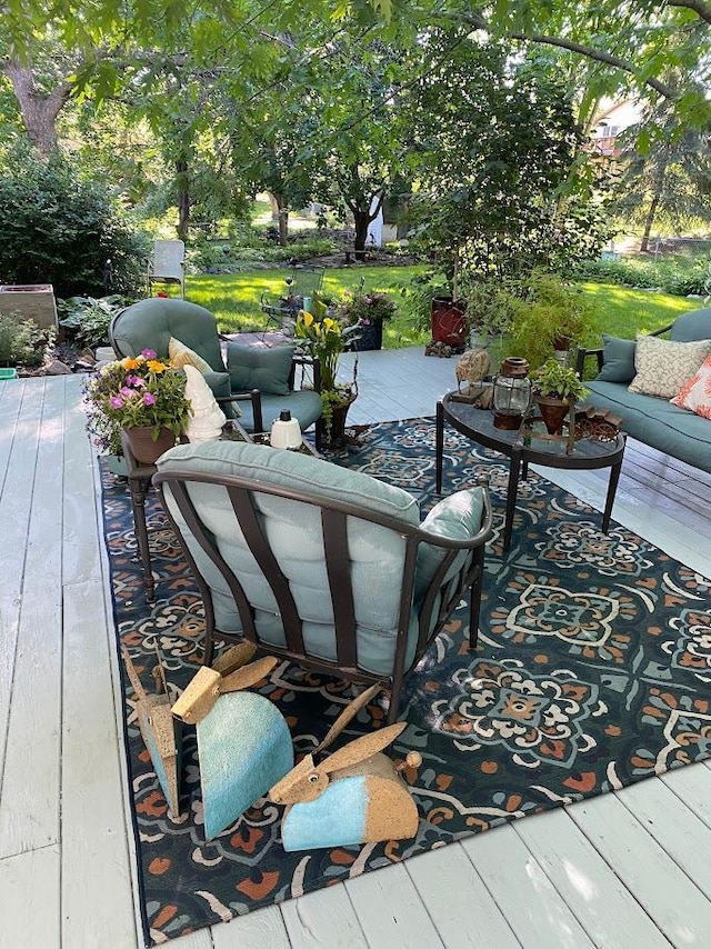 exterior space with a wooden deck and an outdoor living space
