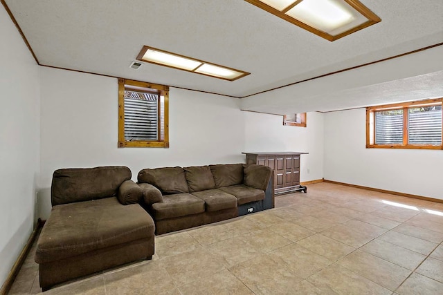 living room featuring baseboards, a bar, light tile patterned flooring, and visible vents