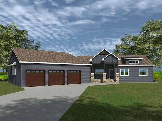 view of front of home with board and batten siding, a front lawn, driveway, and a garage