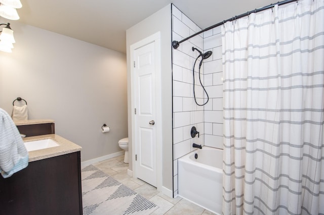 bathroom with vanity, shower / tub combo with curtain, toilet, baseboards, and tile patterned floors