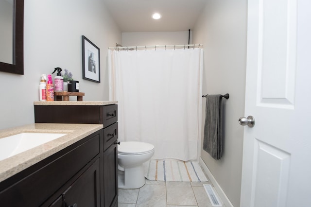 bathroom featuring tile patterned flooring, vanity, toilet, curtained shower, and visible vents