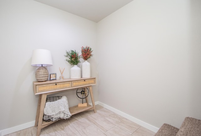 interior space featuring baseboards