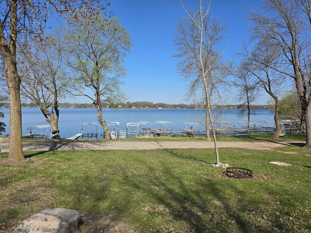 property view of water with a dock