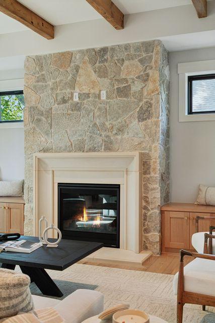 9399 Eagle Ridge Way, Chanhassen, MN 55317 - detailed view of wood finished floors, a glass covered fireplace, and beamed ceiling