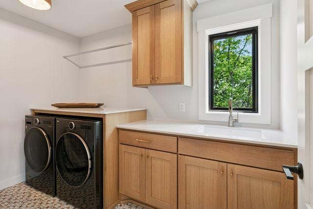 9399 Eagle Ridge Way, Chanhassen, MN 55317 - laundry area featuring washing machine and clothes dryer and cabinet space