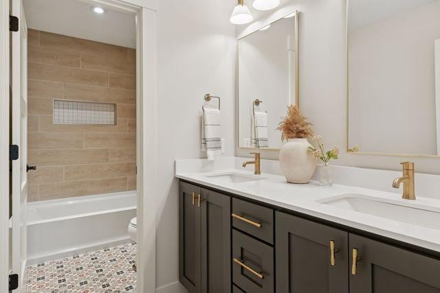 9399 Eagle Ridge Way, Chanhassen, MN 55317 - bathroom with double vanity,  shower combination, and recessed lighting