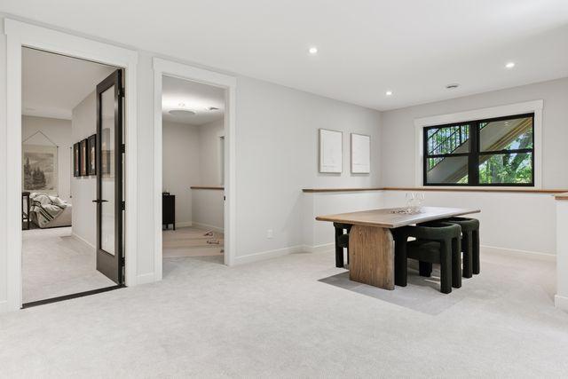 9399 Eagle Ridge Way, Chanhassen, MN 55317 - unfurnished dining area with carpet floors and recessed lighting