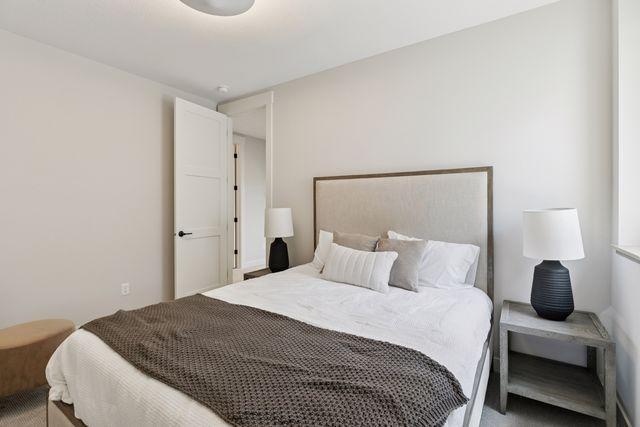 9399 Eagle Ridge Way, Chanhassen, MN 55317 - bedroom with carpet floors