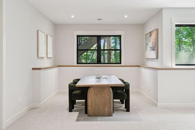 9399 Eagle Ridge Way, Chanhassen, MN 55317 - carpeted dining area with plenty of natural light and recessed lighting