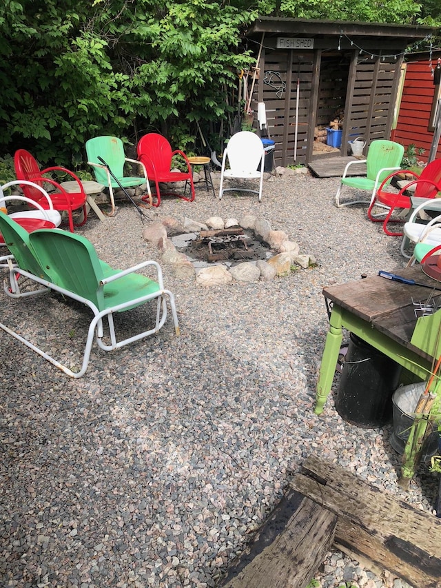 exterior space featuring a fire pit