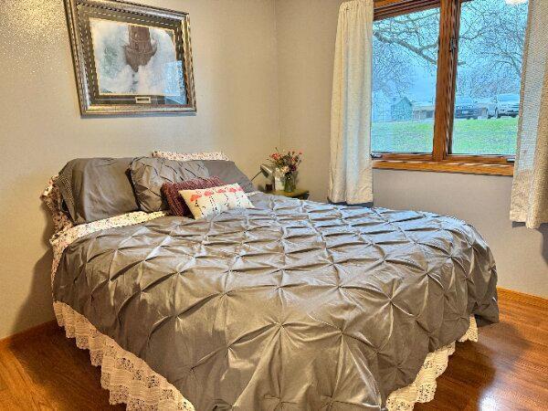 bedroom with wood finished floors