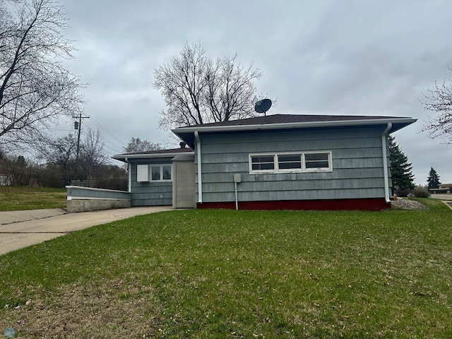 exterior space with a front lawn
