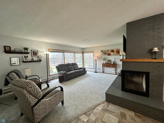 living room with a textured ceiling, light colored carpet, a fireplace, a baseboard radiator, and a baseboard heating unit