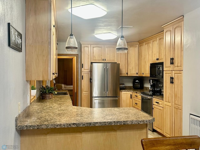 kitchen featuring stainless steel appliances, hanging light fixtures, a peninsula, and light brown cabinets