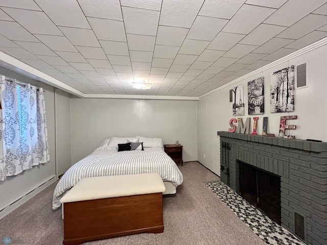 bedroom featuring carpet floors, ornamental molding, and a brick fireplace