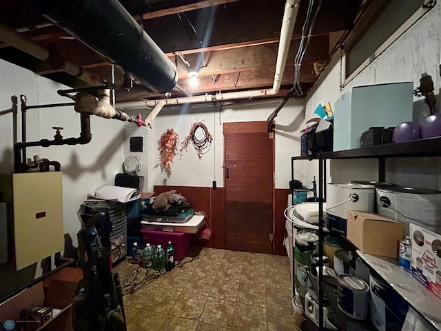 unfinished basement with wainscoting