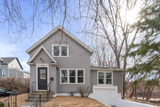 view of front facade featuring an attached garage and driveway