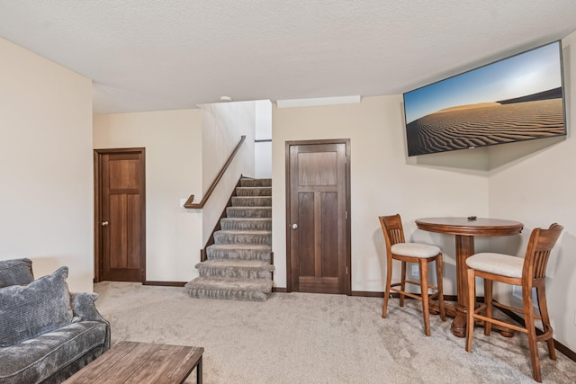 3623 Cove Point Cir NW, Prior Lake, MN 55372 - carpeted living room with stairs and baseboards