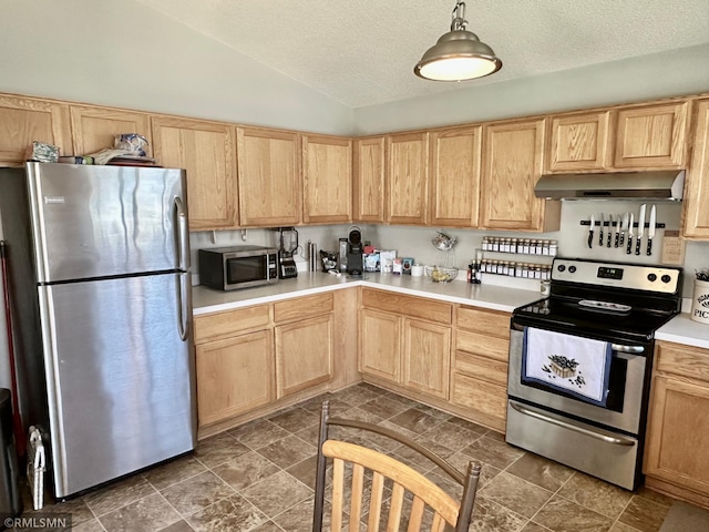 kitchen featuring under cabinet range hood, stainless steel appliances, and light brown cabinetry