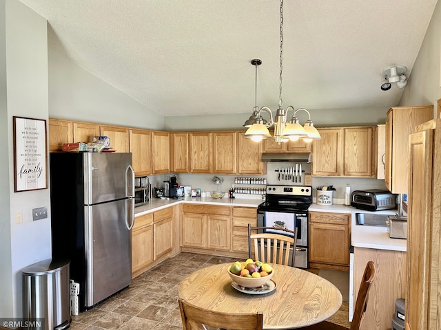 kitchen featuring light brown cabinetry, appliances with stainless steel finishes, an inviting chandelier, light countertops, and under cabinet range hood