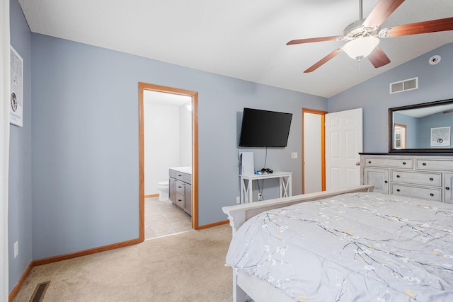 bedroom featuring visible vents, baseboards, vaulted ceiling, and light carpet