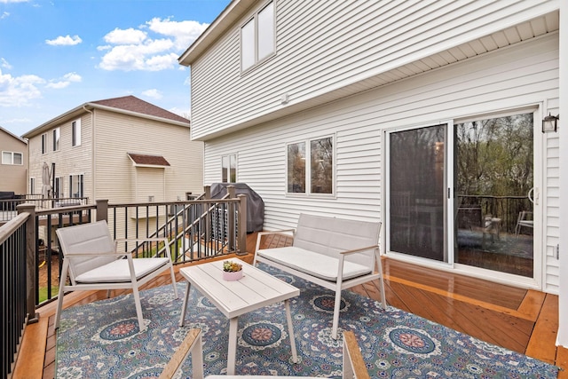 deck featuring a grill